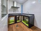 Modern kitchen with cabinets open showcasing under-sink storage