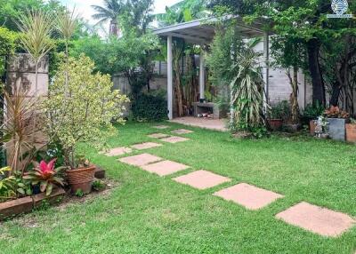 Beautifully landscaped garden with paving stones