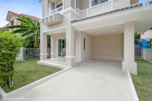 Front view of a house with a porch and garage