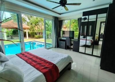 Modern bedroom with pool view