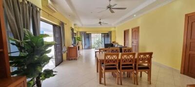 Spacious and well-lit dining area with modern furnishings