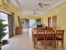 Spacious and well-lit dining area with modern furnishings