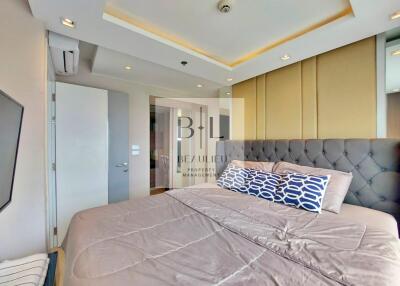 Modern bedroom with stylish decor and lighting