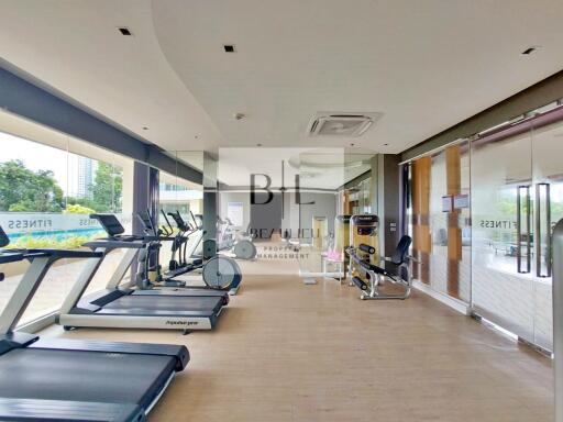 Indoor gym with various exercise equipment