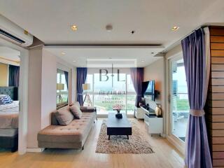 Spacious and well-lit living room with modern décor