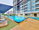 Modern residential building with outdoor swimming pool area