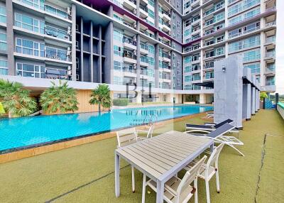 Modern apartment building with a swimming pool