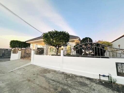 Front view of a house with gated entrance