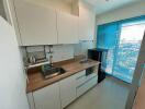 Compact kitchen with necessary appliances