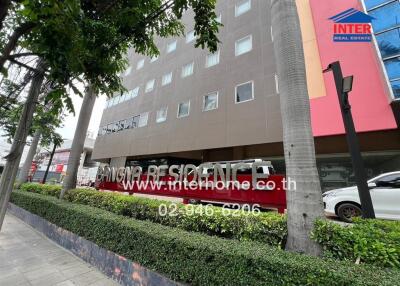 Exterior view of the Inter Residence building with visible contact information on signage