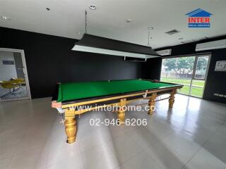 Game room with a pool table