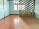 Bedroom with lattice partition, tiled ceiling and floor