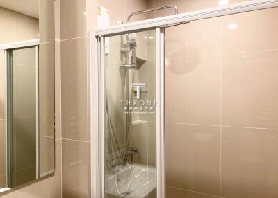 Modern bathroom with glass shower enclosure