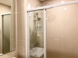 Modern bathroom with glass shower enclosure