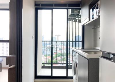 Modern kitchen with balcony view