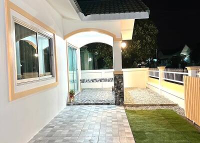 Front yard of a house at night