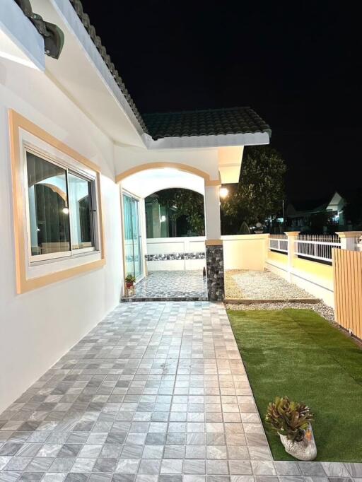 Front yard of a house at night