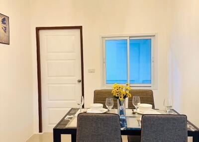 Dining room with table set for meal