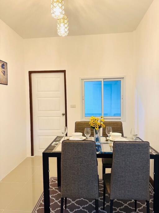 Dining room with table set for meal