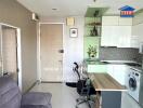 Modern kitchen with green cabinets, washing machine, and adjoining workspace