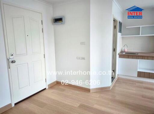 Minimalist kitchen area with wooden floor