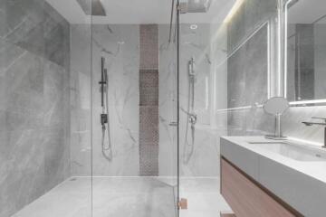 Modern bathroom with glass-enclosed shower and vanity