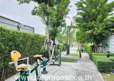 Outdoor gym equipment and greenery