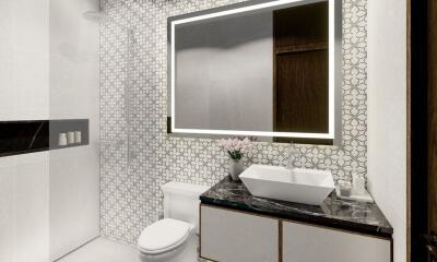 Modern bathroom with a large illuminated mirror and geometric wall tiles