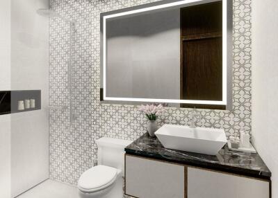 Modern bathroom with decorative tiles, illuminated mirror, and a vessel sink