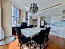 Elegant dining area with a view of the kitchen