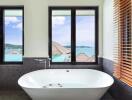 Luxurious bathroom with a panoramic ocean view