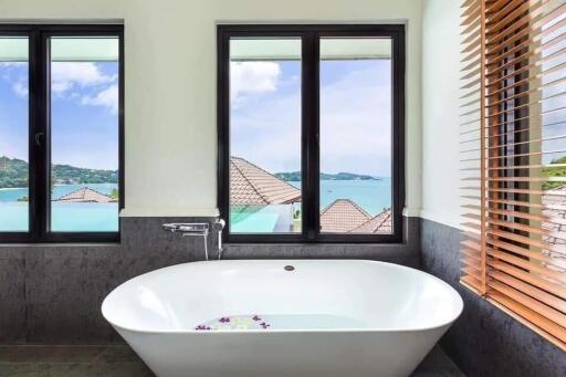 Luxurious bathroom with a panoramic ocean view