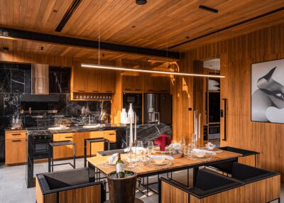 Modern kitchen with dining area and wooden interior