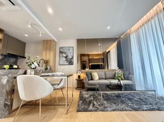 Modern living room and dining area with contemporary furnishings