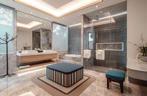 Modern bathroom with glass shower and bathtub