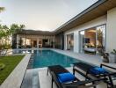 Modern outdoor area with a swimming pool and lounge chairs