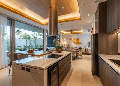 Modern kitchen with island and view of dining area