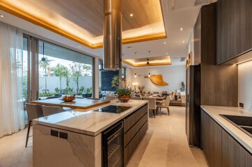 Modern kitchen with island and view of dining area