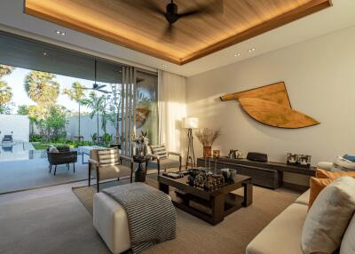 Modern living room with wooden ceiling and outdoor pool view