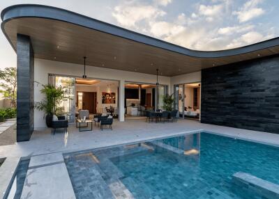 modern outdoor living area with pool