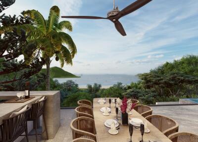 Outdoor dining area with scenic ocean view