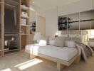 Modern bedroom with natural light and contemporary furnishings.