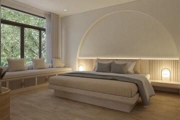 Modern bedroom with large bed and window seating