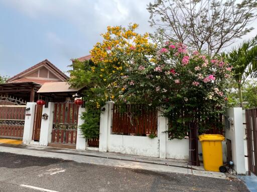 Front view of the house with garden