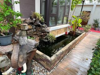 Outdoor garden with water feature