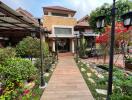 Front view of a house with garden and walkway