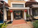 Front entrance of a house decorated with red lanterns