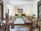 Spacious dining room with wooden furniture and modern decor