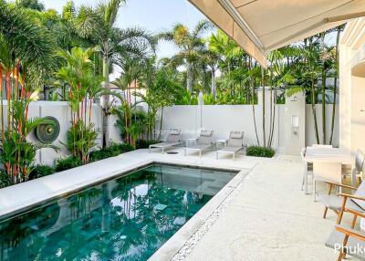 Modern outdoor area with swimming pool and seating arrangements