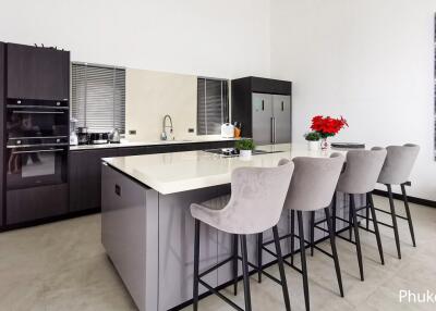 Modern kitchen with island and bar stools